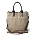 hand carry canvas shoulder bag with leather trim